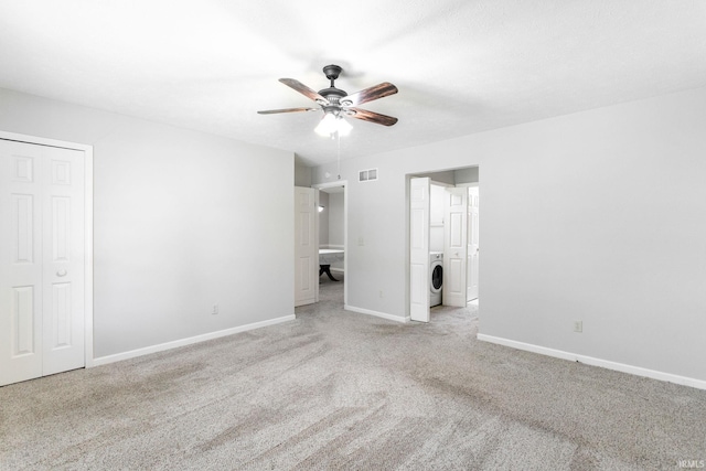 5709 Bayswater Ct, South Bend, IN 46614 - unfurnished bedroom featuring washer / dryer, carpet, baseboards, and ceiling fan