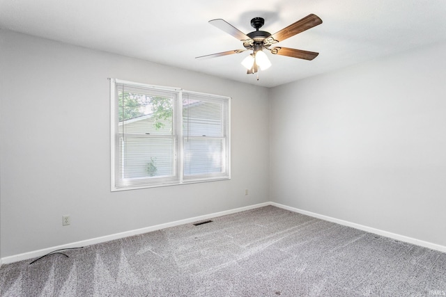 5709 Bayswater Ct, South Bend, IN 46614 - carpeted spare room featuring baseboards and ceiling fan