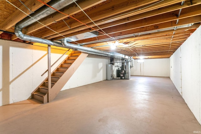 5709 Bayswater Ct, South Bend, IN 46614 - unfinished below grade area featuring water heater, stairs, and heating unit