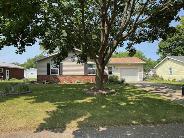 1414 Spear St, Rochester, IN 46975 - ranch-style home with driveway, an attached garage, a front yard, and brick siding