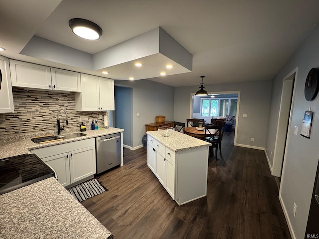 1414 Spear St, Rochester, IN 46975 - kitchen with dishwasher, decorative backsplash, white cabinets, and recessed lighting
