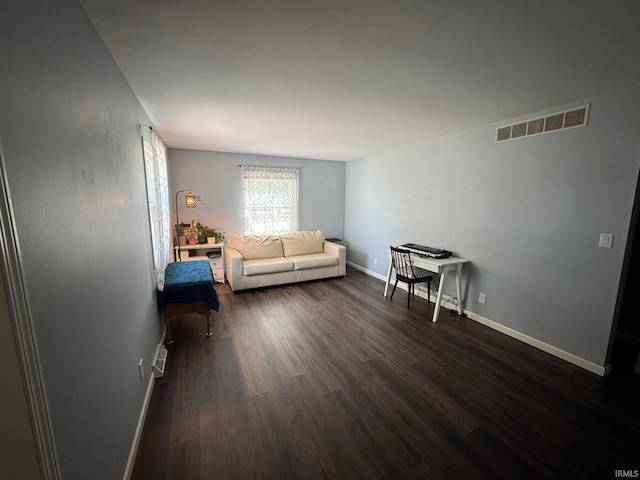 1414 Spear St, Rochester, IN 46975 - living room featuring dark wood-type flooring and baseboards