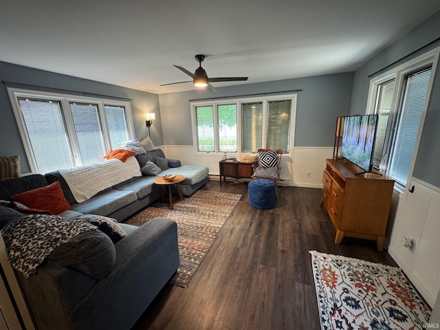 1414 Spear St, Rochester, IN 46975 - living room featuring a wainscoted wall, dark wood-type flooring, and ceiling fan