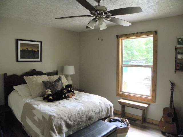 3116 Truesdel Rd, Gosport, IN 47433 - bedroom featuring a textured ceiling and a ceiling fan