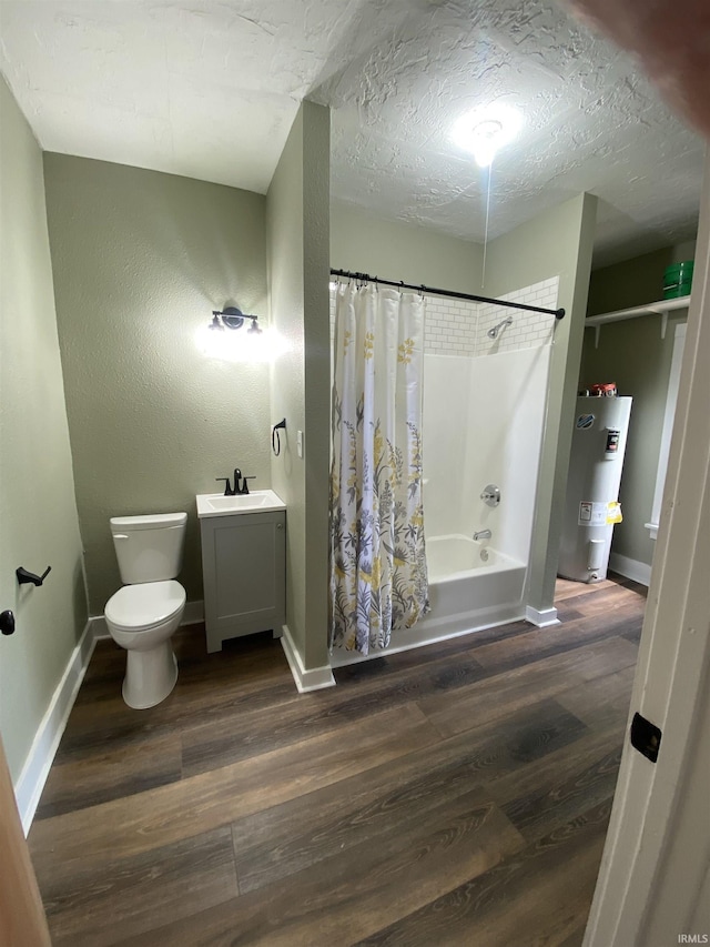 1824 Boxcar Ln, Auburn, IN 47606 - full bath featuring electric water heater, toilet, wood finished floors, shower / bath combo, and baseboards
