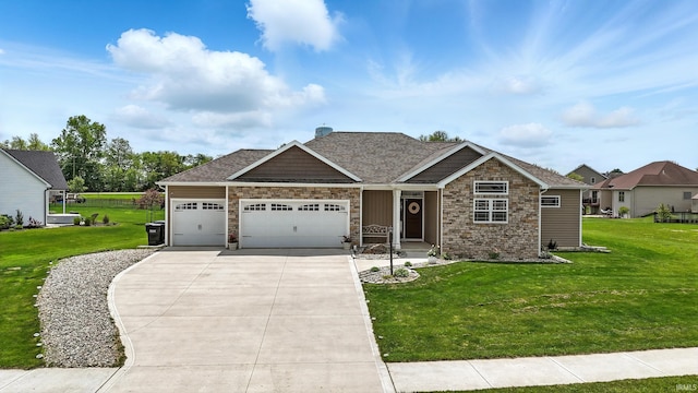 17009 Hamptons Pkwy, New Haven, IN 46774 - craftsman inspired home featuring a garage, stone siding, concrete driveway, and a front lawn