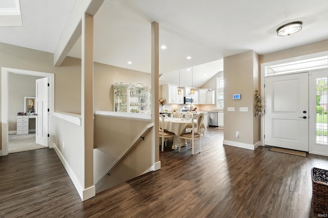 17009 Hamptons Pkwy, New Haven, IN 46774 - foyer featuring dark wood finished floors, baseboards, and vaulted ceiling