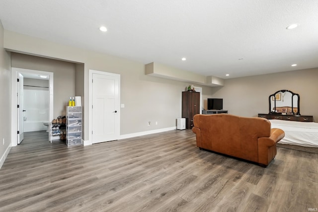 17009 Hamptons Pkwy, New Haven, IN 46774 - living room featuring baseboards, wood finished floors, and recessed lighting