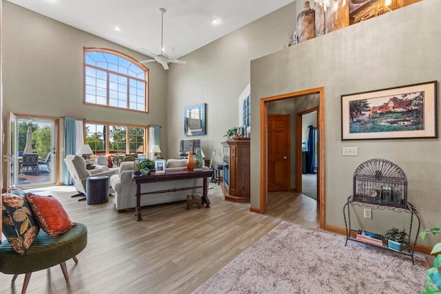 6378 N 100 E, Ossian, IN 46777 - living area featuring a high ceiling, light wood-style floors, a ceiling fan, recessed lighting, and baseboards