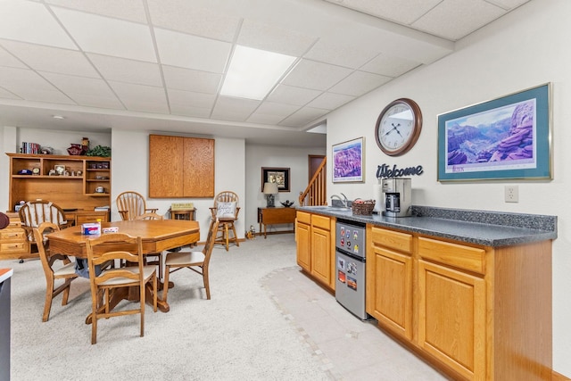 6378 N 100 E, Ossian, IN 46777 - dining space featuring a drop ceiling, stairway, and light colored carpet