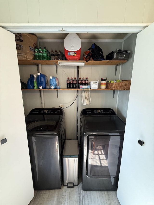 2520 Foxhall Dr, Lafayette, IN 47909 - laundry room featuring washing machine and clothes dryer and wood finished floors