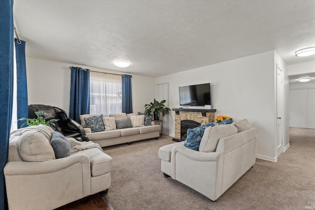 2614 N Main St, Mishawaka, IN 46545 - carpeted living room featuring a textured ceiling and a fireplace