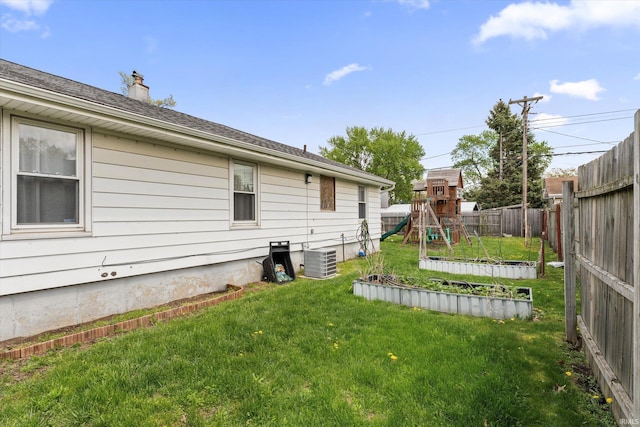 2614 N Main St, Mishawaka, IN 46545 - view of yard with a playground and central AC unit