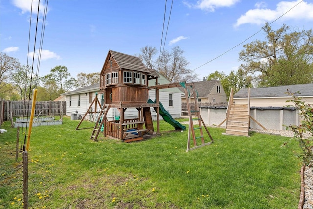 2614 N Main St, Mishawaka, IN 46545 - view of play area with central AC and stairs