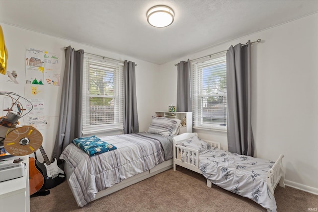 2614 N Main St, Mishawaka, IN 46545 - bedroom with multiple windows and carpet
