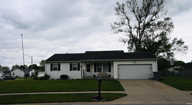 907 Eagle Blvd, Bristol, IN 46507 - single story home with a garage, driveway, and covered porch