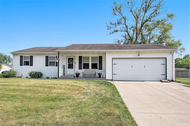 907 Eagle Blvd, Bristol, IN 46507 - ranch-style house featuring a garage, driveway, and a porch