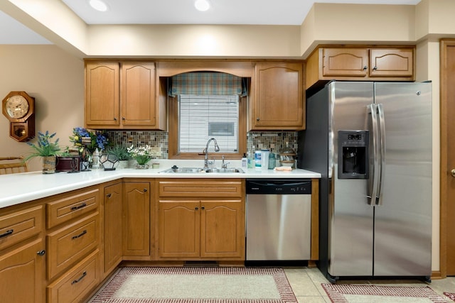 1114 Packard Pl, Auburn, IN 46706 - kitchen featuring stainless steel appliances, a sink, tasteful backsplash, light countertops, and recessed lighting