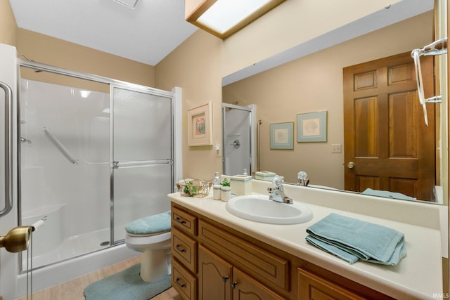 1114 Packard Pl, Auburn, IN 46706 - bathroom with a shower stall, vanity, and toilet