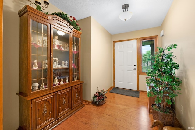 1114 Packard Pl, Auburn, IN 46706 - foyer entrance featuring light wood finished floors and baseboards