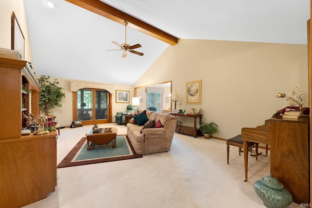 1114 Packard Pl, Auburn, IN 46706 - carpeted living area featuring beam ceiling, a ceiling fan, high vaulted ceiling, and baseboards