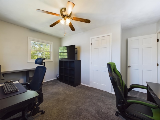 1326 Stag Dr, Fort Wayne, IN 46804 - home office featuring ceiling fan, dark carpet, and baseboards