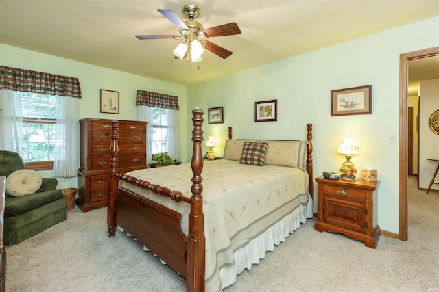 54363 Adrian Ct, Osceola, IN 46561 - carpeted bedroom with multiple windows, a ceiling fan, and baseboards