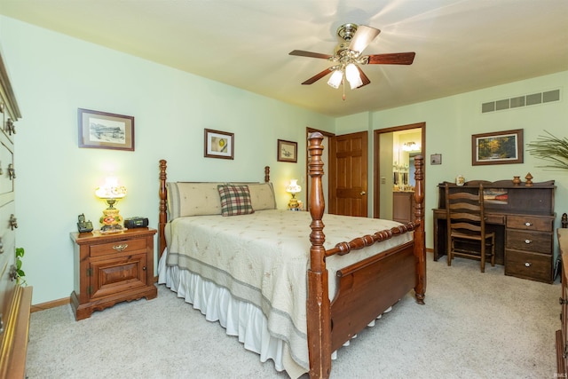 54363 Adrian Ct, Osceola, IN 46561 - bedroom featuring light carpet, ensuite bathroom, baseboards, and ceiling fan