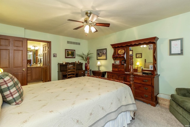 54363 Adrian Ct, Osceola, IN 46561 - bedroom featuring light carpet, ensuite bath, and a ceiling fan