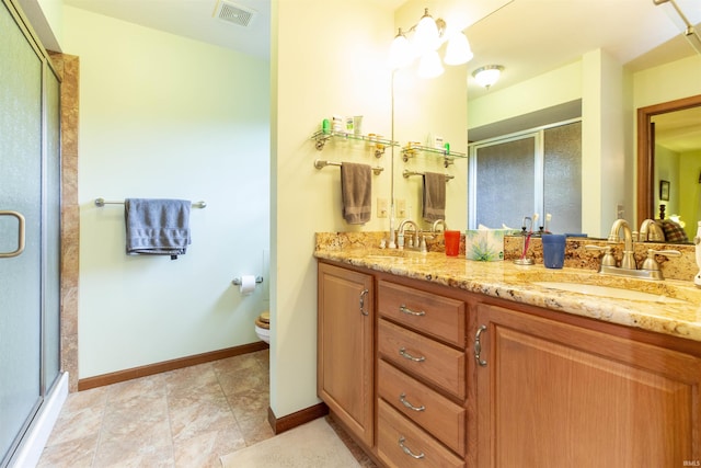 54363 Adrian Ct, Osceola, IN 46561 - bathroom featuring double vanity, a stall shower, and toilet