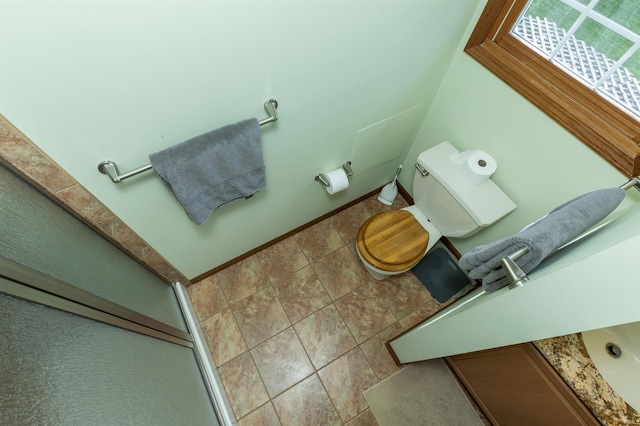 54363 Adrian Ct, Osceola, IN 46561 - bathroom with toilet and baseboards