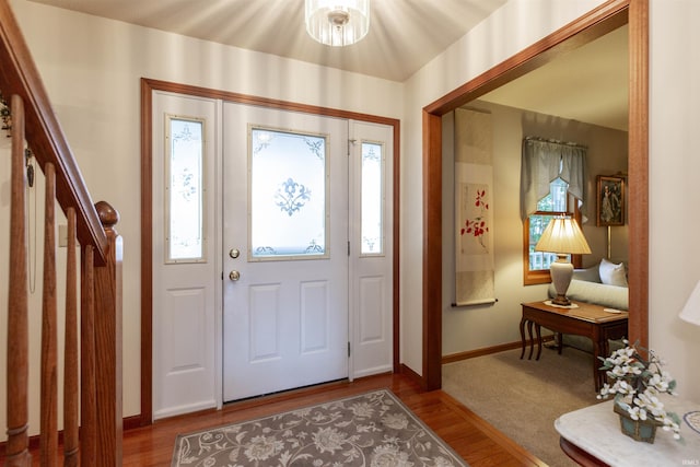 54363 Adrian Ct, Osceola, IN 46561 - foyer featuring healthy amount of natural light, baseboards, wood finished floors, and stairs