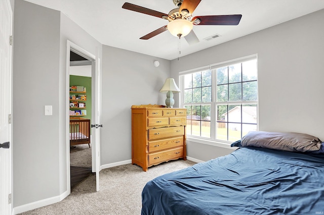 843 S Lantern Ln, Ellettsville, IN 47401 - bedroom with light carpet, baseboards, and a ceiling fan