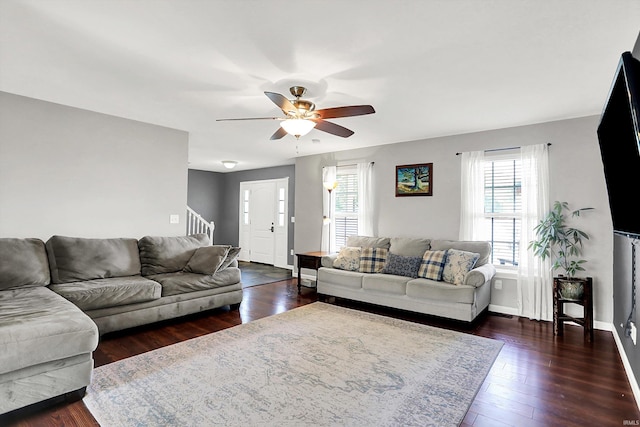 843 S Lantern Ln, Ellettsville, IN 47401 - living room featuring plenty of natural light, a ceiling fan, stairway, and dark wood-style floors