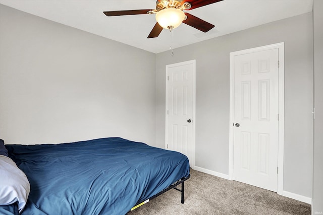 843 S Lantern Ln, Ellettsville, IN 47401 - carpeted bedroom with baseboards and ceiling fan