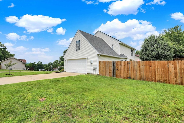 843 S Lantern Ln, Ellettsville, IN 47401 - view of property exterior featuring an attached garage and concrete driveway