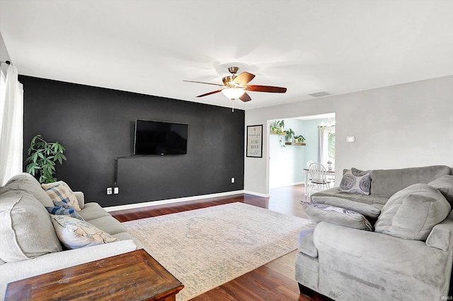 843 S Lantern Ln, Ellettsville, IN 47401 - living room with a ceiling fan, dark wood-style flooring, and baseboards