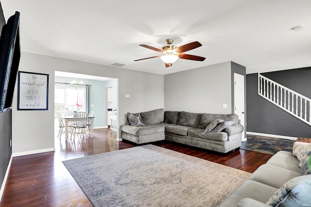 843 S Lantern Ln, Ellettsville, IN 47401 - living room with stairway, ceiling fan, a chandelier, and wood finished floors