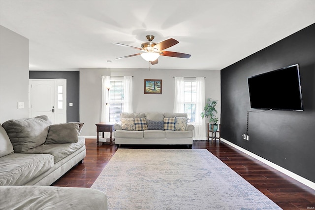 843 S Lantern Ln, Ellettsville, IN 47401 - living room featuring a ceiling fan, dark wood-style floors, and baseboards