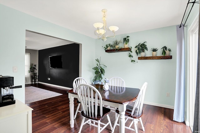 843 S Lantern Ln, Ellettsville, IN 47401 - dining room featuring a chandelier, wood finished floors, and baseboards