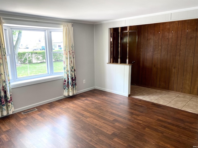 4234 Oak St, Woodburn, IN 46797 - unfurnished room featuring wood finished floors, ornamental molding, and baseboards