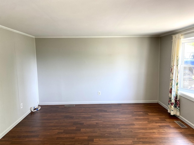 4234 Oak St, Woodburn, IN 46797 - spare room featuring wood finished floors, crown molding, and baseboards