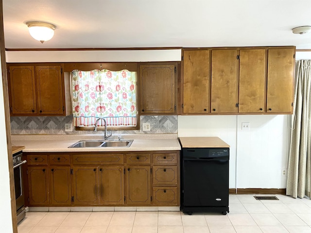 4234 Oak St, Woodburn, IN 46797 - kitchen featuring a sink, dishwasher, stove, baseboards, and light countertops