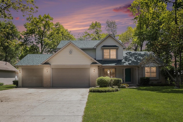 58078 Windsong Dr, Elkhart, IN 46517 - traditional home with an attached garage, driveway, a yard, covered porch, and brick siding