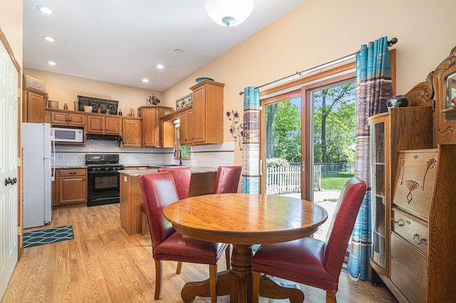 58078 Windsong Dr, Elkhart, IN 46517 - dining area featuring light wood finished floors and recessed lighting