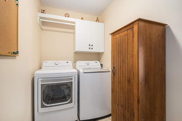 58078 Windsong Dr, Elkhart, IN 46517 - washroom with cabinet space and washer and clothes dryer