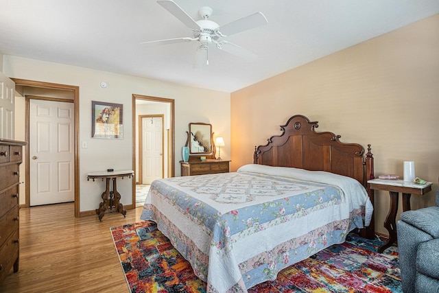 58078 Windsong Dr, Elkhart, IN 46517 - bedroom with light wood-style floors, baseboards, and a ceiling fan