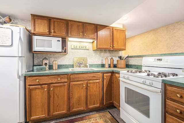 58078 Windsong Dr, Elkhart, IN 46517 - kitchen with white appliances, a sink, brown cabinets, and tasteful backsplash