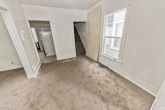232 E Grove St, Mishawaka, IN 46545 - unfurnished bedroom featuring carpet flooring and baseboards