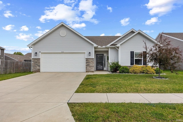 2612 Glastonbury Way, Lafayette, IN 47909 - ranch-style house featuring driveway, a garage, and stone siding
